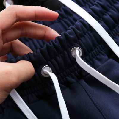 SHORT POLY XANH ĐEN